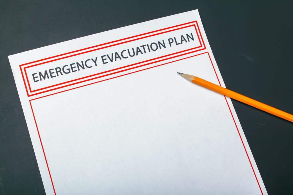 image of an emergency evacuation plan being written in case of a storm or hurricane
