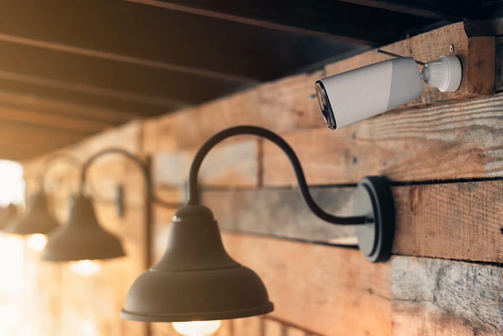 A security camera installed at a home to deter theft and vandalism